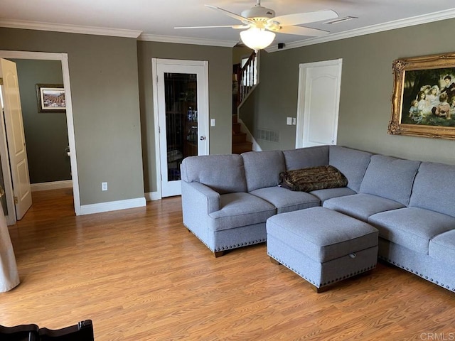 6172 Tamilynn St, San Diego, CA 92122 - living room featuring light wood-type flooring, ceiling fan, baseboards, crown molding, and stairway