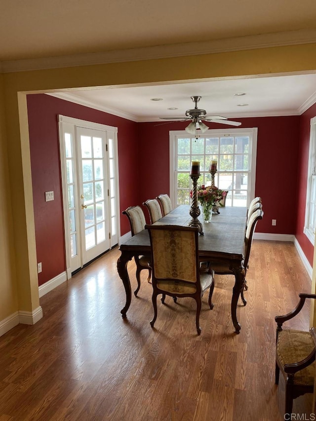 6172 Tamilynn St, San Diego, CA 92122 - dining room with wood finished floors, ceiling fan, baseboards, and ornamental molding