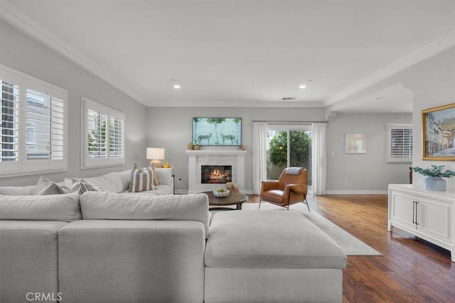 1817 Clark Ln Unit B, Redondo Beach, CA 90278 - living area with dark wood-style floors, crown molding, a glass covered fireplace, baseboards, and recessed lighting