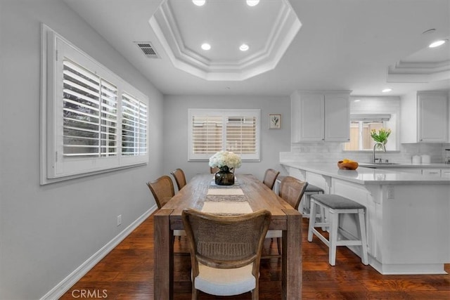 1817 Clark Ln Unit B, Redondo Beach, CA 90278 - dining space featuring recessed lighting, a tray ceiling, plenty of natural light, dark wood-style floors, and baseboards