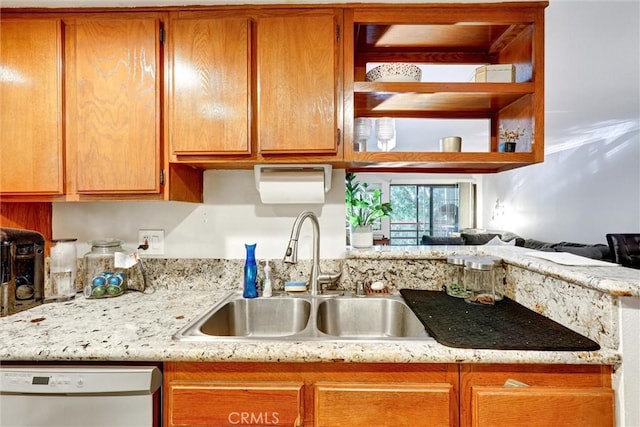 1118 Valencia St Unit 216, Los Angeles, CA 90015 - kitchen featuring a sink, white dishwasher, light stone countertops, and brown cabinetry