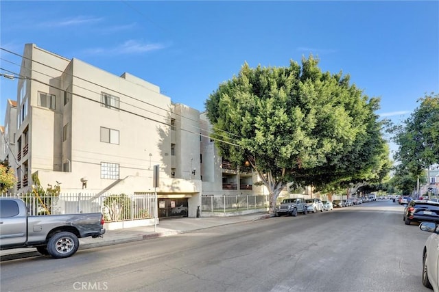 1118 Valencia St Unit 216, Los Angeles, CA 90015 - view of building exterior with fence