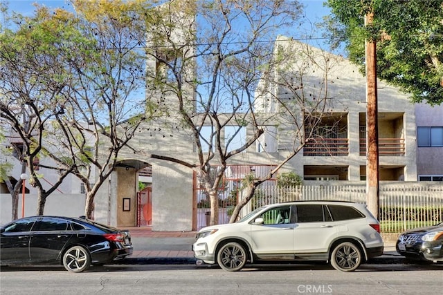 1118 Valencia St Unit 216, Los Angeles, CA 90015 - view of building exterior featuring fence