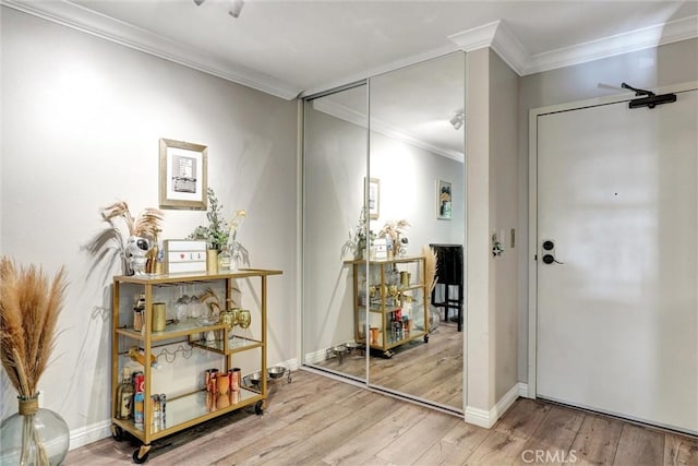 1118 Valencia St Unit 216, Los Angeles, CA 90015 - hall featuring wood finished floors, crown molding, and baseboards