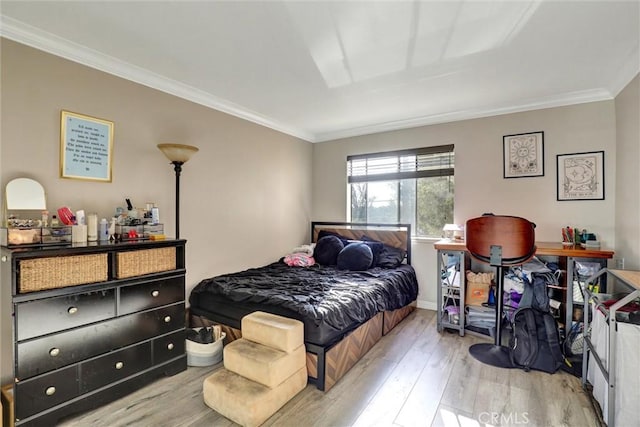 1118 Valencia St Unit 216, Los Angeles, CA 90015 - bedroom with wood finished floors, ornamental molding, and baseboards