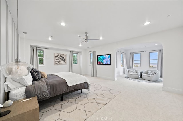 12 Via Alcamo, San Clemente, CA 92673 - bedroom featuring arched walkways, recessed lighting, light carpet, baseboards, and a ceiling fan