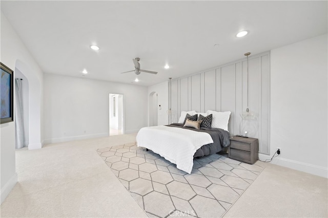 12 Via Alcamo, San Clemente, CA 92673 - bedroom with recessed lighting, light colored carpet, arched walkways, a ceiling fan, and baseboards