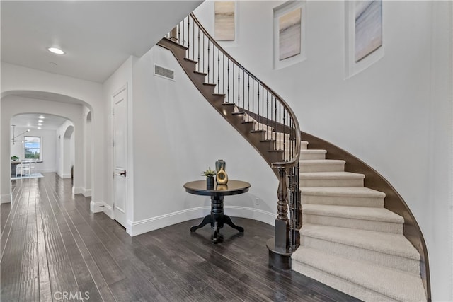 12 Via Alcamo, San Clemente, CA 92673 - stairway with wood finished floors, arched walkways, baseboards, and recessed lighting