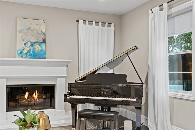 12 Via Alcamo, San Clemente, CA 92673 - living area with baseboards and a warm lit fireplace