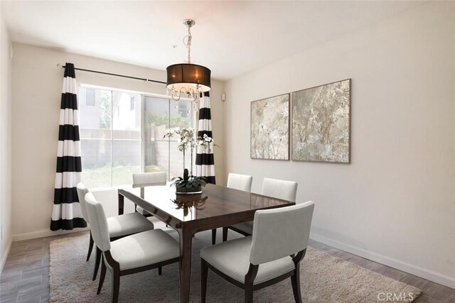 5354 Wrangler Dr, Fontana, CA 92336 - dining room with baseboards and wood finished floors