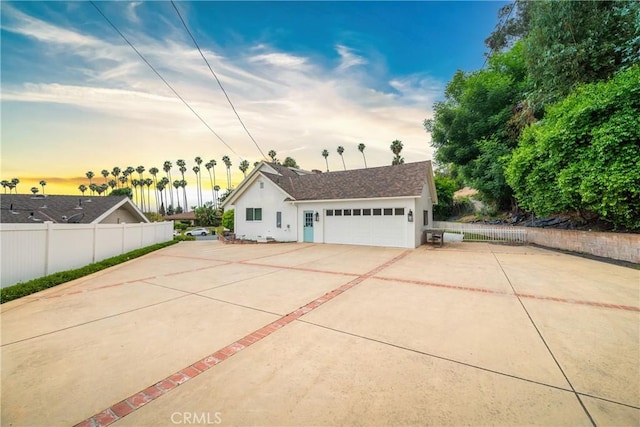 780 Brown Sage Dr, Glendora, CA 91741 - view of side of property featuring concrete driveway, stucco siding, and a garage