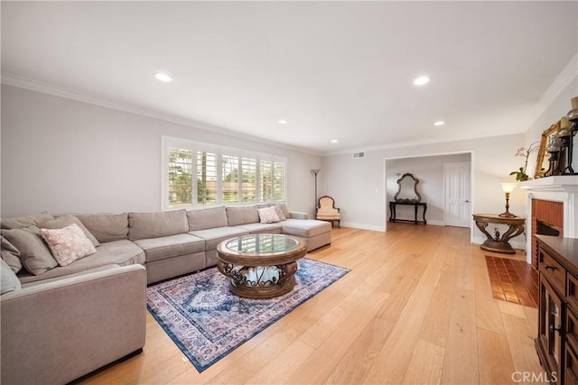 780 Brown Sage Dr, Glendora, CA 91741 - living area with light wood-style floors, recessed lighting, crown molding, baseboards, and a brick fireplace