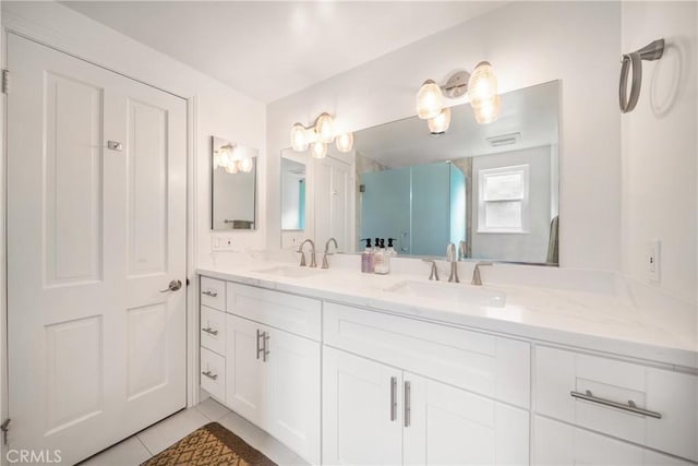 780 Brown Sage Dr, Glendora, CA 91741 - bathroom with double vanity, tile patterned floors, and a shower with door
