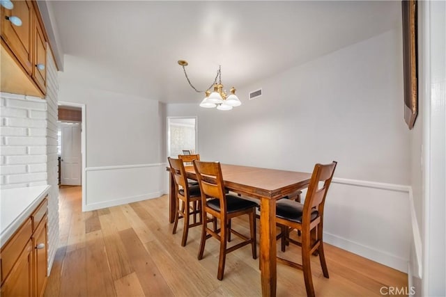 780 Brown Sage Dr, Glendora, CA 91741 - dining space with light wood-style floors, a chandelier, and baseboards
