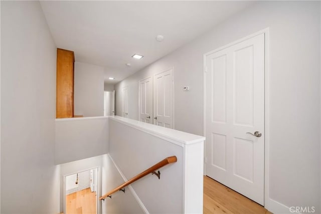 780 Brown Sage Dr, Glendora, CA 91741 - hallway with an upstairs landing, light wood-style flooring, and recessed lighting