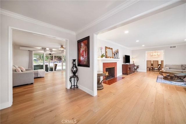 780 Brown Sage Dr, Glendora, CA 91741 - living area featuring light wood-style flooring, a fireplace, baseboards, ornamental molding, and recessed lighting