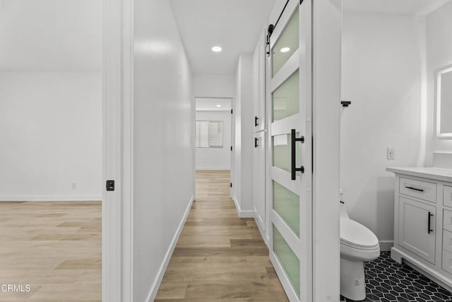 6721 S Springpark Ave Unit 3A, Los Angeles, CA 90056 - hallway with recessed lighting, light wood-type flooring, and baseboards