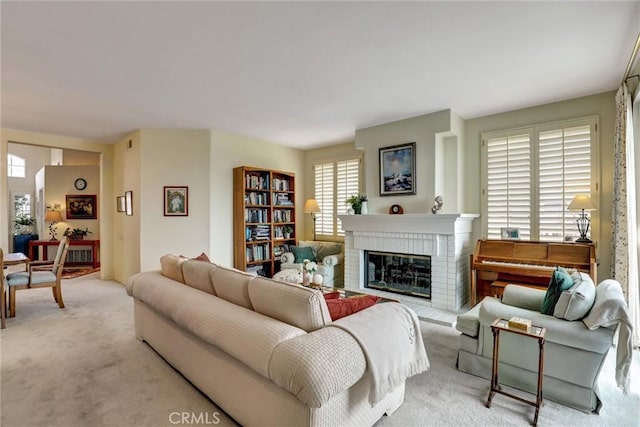 3511 Daffodil Ave Unit 14, Corona Del Mar, CA 92625 - living room with carpet floors and a brick fireplace
