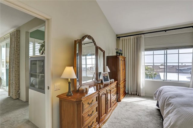 3511 Daffodil Ave Unit 14, Corona Del Mar, CA 92625 - bedroom with light colored carpet, multiple windows, and lofted ceiling