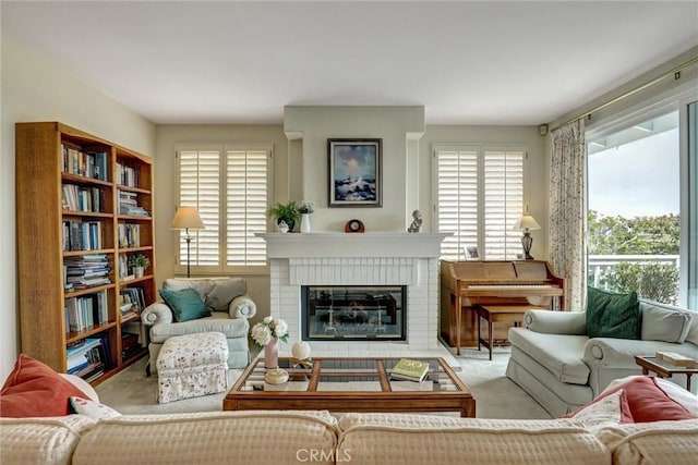 3511 Daffodil Ave Unit 14, Corona Del Mar, CA 92625 - living area with plenty of natural light, carpet floors, and a fireplace