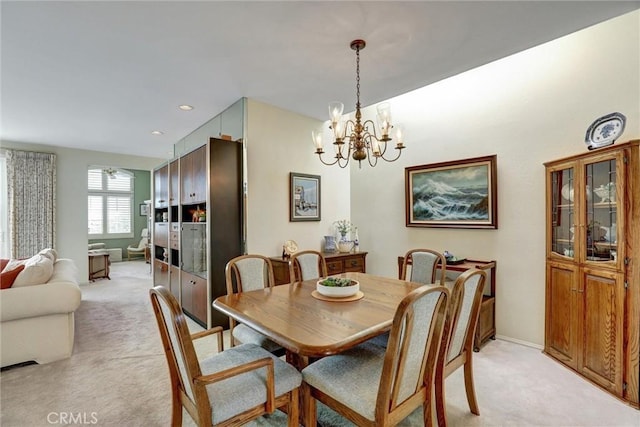 3511 Daffodil Ave Unit 14, Corona Del Mar, CA 92625 - dining room featuring light colored carpet, a chandelier, baseboards, and recessed lighting