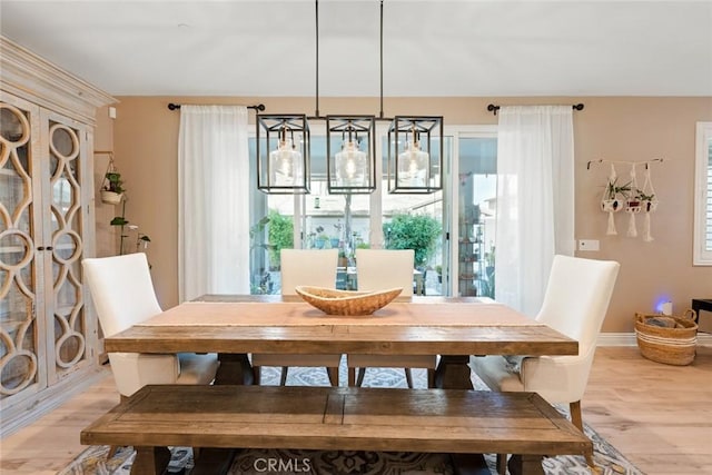 32106 Richardson St, Menifee, CA 92584 - dining area featuring light wood-style flooring and baseboards