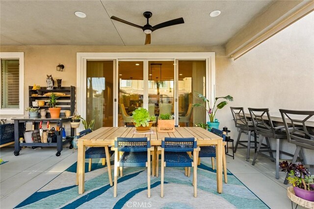 32106 Richardson St, Menifee, CA 92584 - view of patio featuring outdoor dining area and a ceiling fan