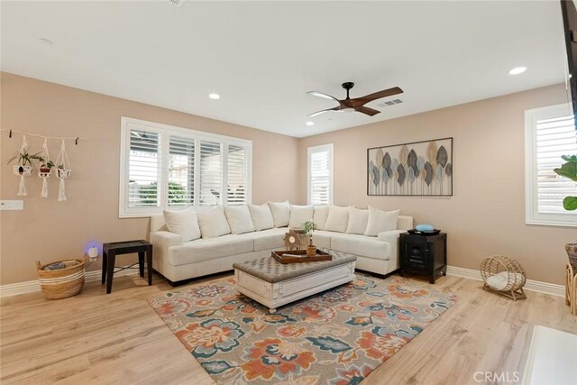 32106 Richardson St, Menifee, CA 92584 - living room with plenty of natural light, wood finished floors, a ceiling fan, and recessed lighting
