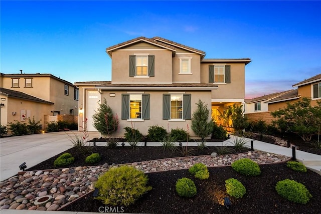 32106 Richardson St, Menifee, CA 92584 - traditional-style house featuring stucco siding, driveway, and an attached garage