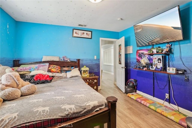3336 Cherokee Ave, South Gate, CA 90280 - bedroom with wood finished floors and baseboards