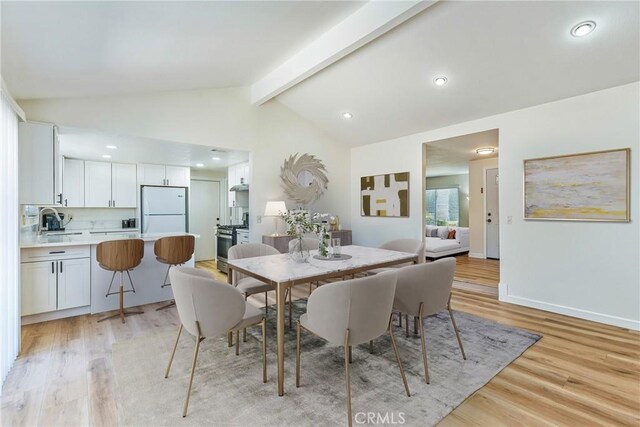 16230 Rodeo St, Hesperia, CA 92345 - dining room with light wood-style flooring, baseboards, and recessed lighting