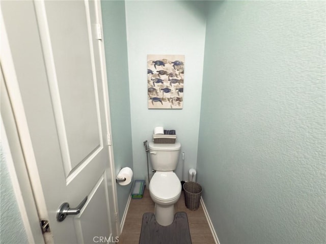 5485 San Roberto, San Diego, CA 92154 - bathroom featuring baseboards and toilet