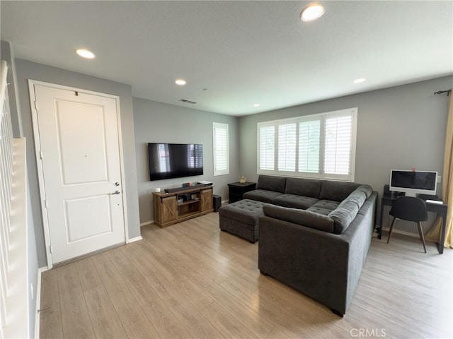 5485 San Roberto, San Diego, CA 92154 - living room featuring light wood-type flooring, recessed lighting, and baseboards