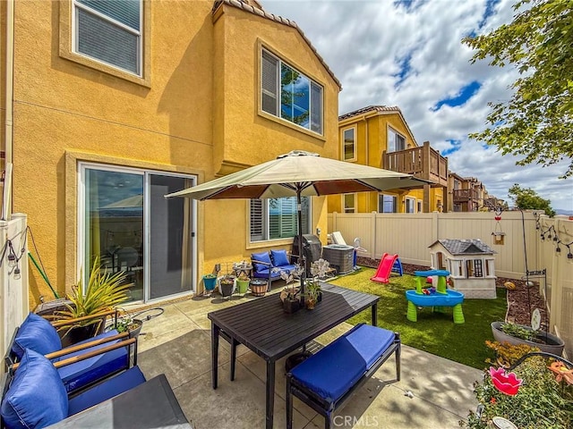 5485 San Roberto, San Diego, CA 92154 - rear view of property with a patio area, stucco siding, a fenced backyard, and outdoor lounge area