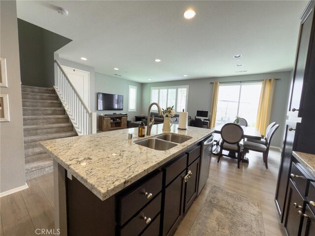 5485 San Roberto, San Diego, CA 92154 - kitchen with a sink, stainless steel dishwasher, open floor plan, recessed lighting, and dark brown cabinets