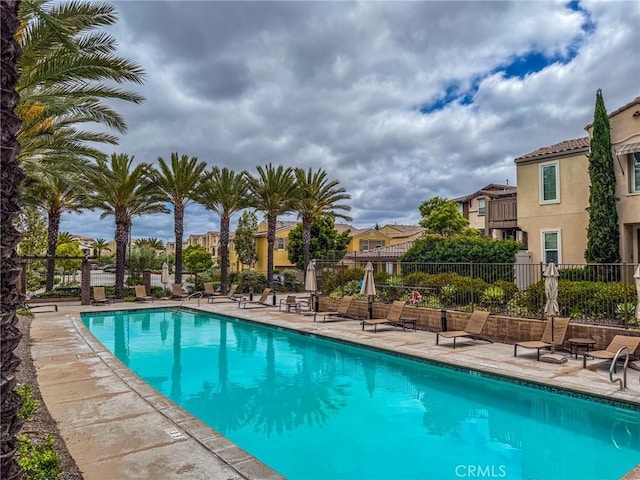5485 San Roberto, San Diego, CA 92154 - community pool with fence, a patio, and a residential view