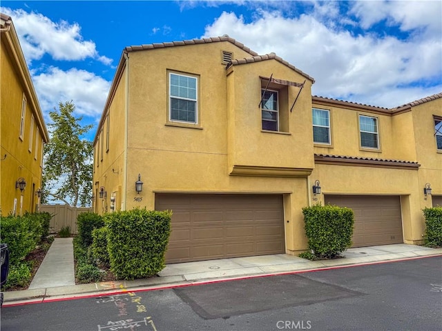 5485 San Roberto, San Diego, CA 92154 - multi unit property featuring stucco siding, a tiled roof, and a garage