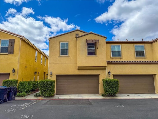 5485 San Roberto, San Diego, CA 92154 - multi unit property featuring stucco siding, a garage, and a tile roof
