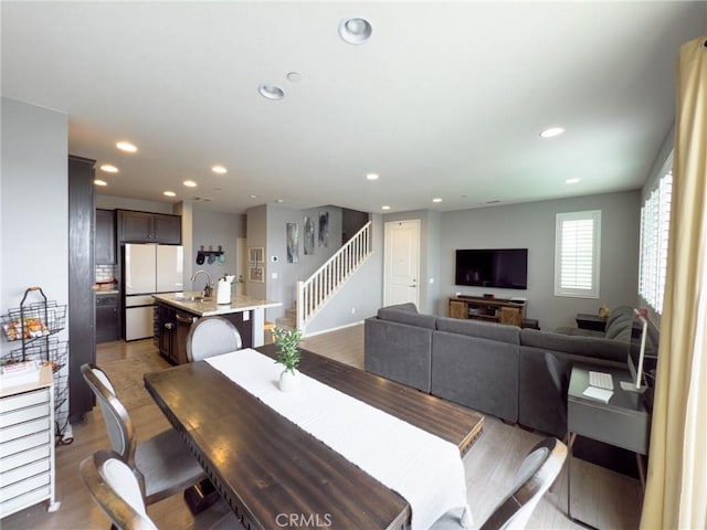 5485 San Roberto, San Diego, CA 92154 - dining area with stairway, recessed lighting, and wood finished floors