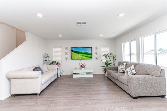 14205 Nicoles Way, Adelanto, CA 92301 - living area with light wood-style flooring, recessed lighting, and baseboards