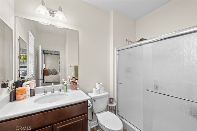 45936 Camino Rubi, Temecula, CA 92592 - bathroom with a shower stall, toilet, vanity, and ensuite bath