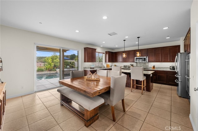 45936 Camino Rubi, Temecula, CA 92592 - dining space with light tile patterned floors, recessed lighting, and baseboards