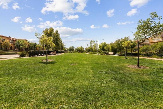 8519 E Kendra Loop, Orange, CA 92867 - surrounding community with a yard
