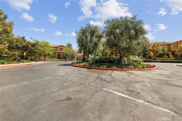 8519 E Kendra Loop, Orange, CA 92867 - view of asphalt street featuring curbs