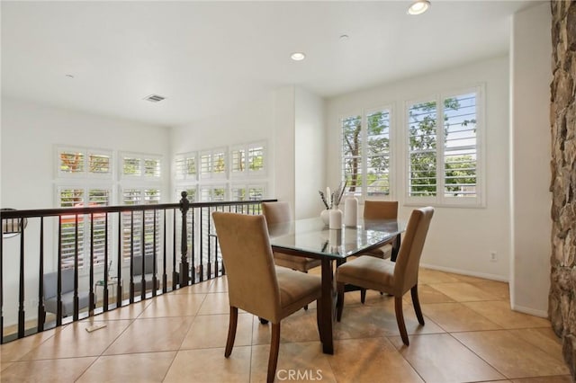 8519 E Kendra Loop, Orange, CA 92867 - dining area with light tile patterned floors, recessed lighting, and baseboards