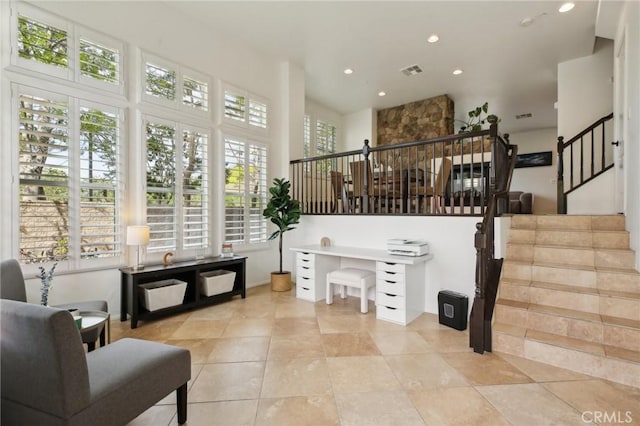 8519 E Kendra Loop, Orange, CA 92867 - stairs featuring recessed lighting, a towering ceiling, and tile patterned flooring
