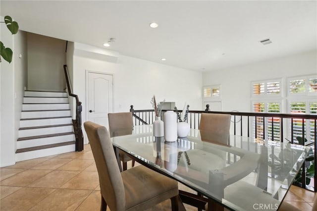 8519 E Kendra Loop, Orange, CA 92867 - dining room featuring light tile patterned flooring, recessed lighting, and stairs