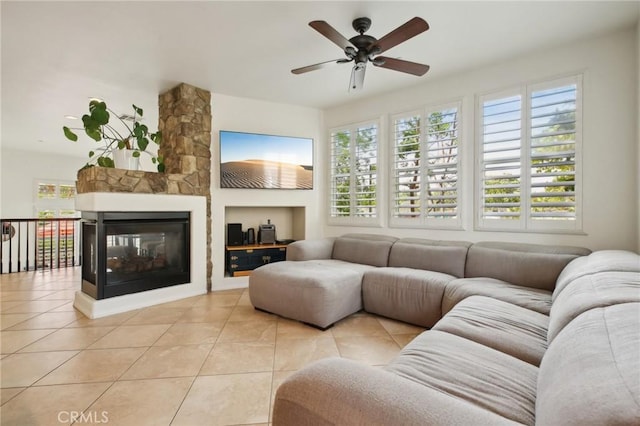 8519 E Kendra Loop, Orange, CA 92867 - living area with light tile patterned flooring, a ceiling fan, and plenty of natural light