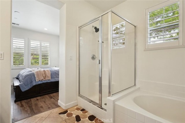 8519 E Kendra Loop, Orange, CA 92867 - bathroom with plenty of natural light, a shower stall, and ensuite bath