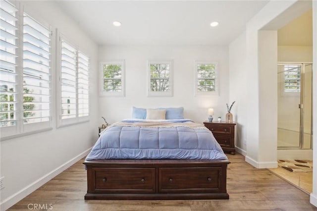 8519 E Kendra Loop, Orange, CA 92867 - bedroom with baseboards, wood finished floors, and recessed lighting